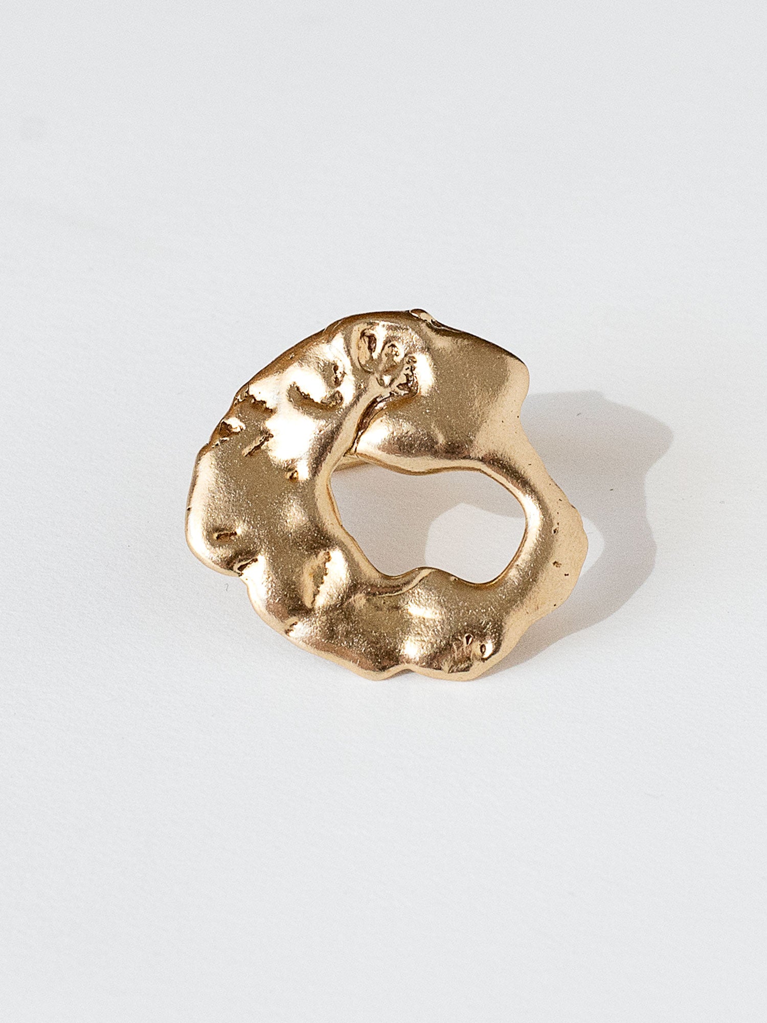 A sculptural statement ring in solid brass handmade by Michelle Ross in Toronto, Canada