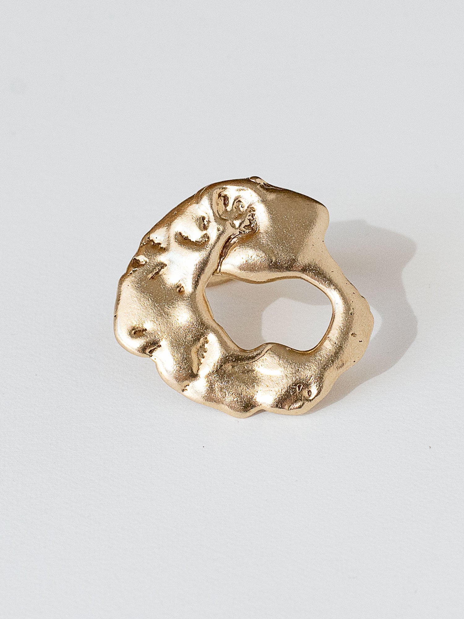 A sculptural statement ring in solid brass handmade by Michelle Ross in Toronto, Canada