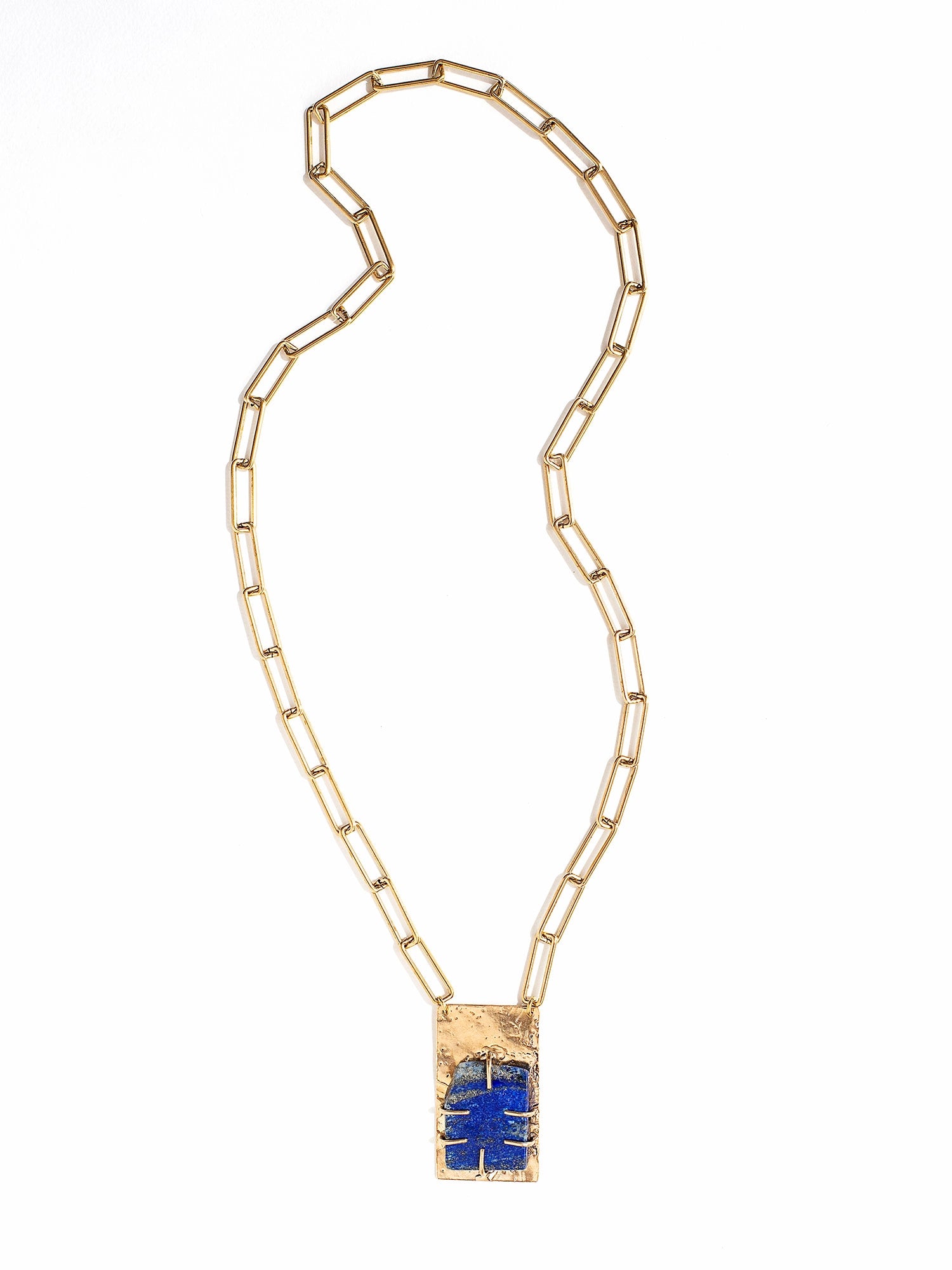 A brass chain link necklace with lapis lazuli and brass pendant handcrafted by Canadian jewelry designer Michelle Ross