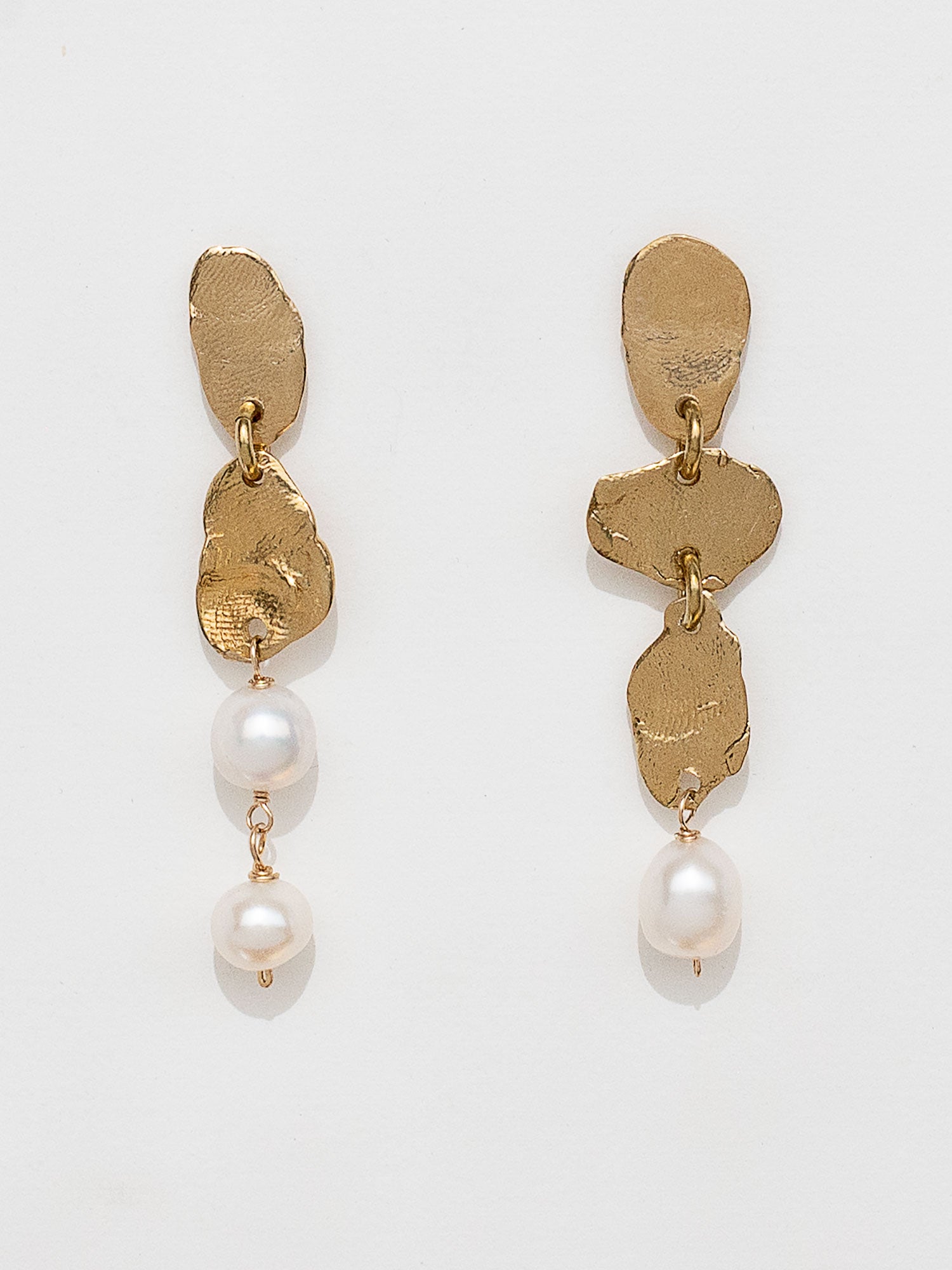 Gold earrings with freshwater pearl drops by Michelle Ross