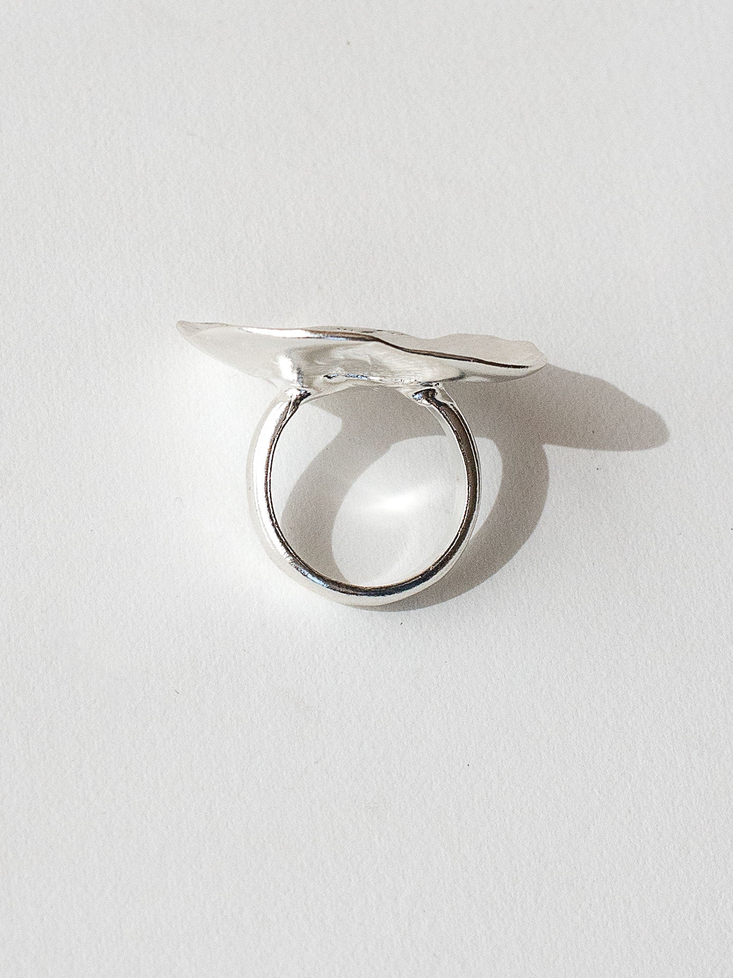 A sculptural statement ring in solid silver handmade by Michelle Ross in Toronto, Canada