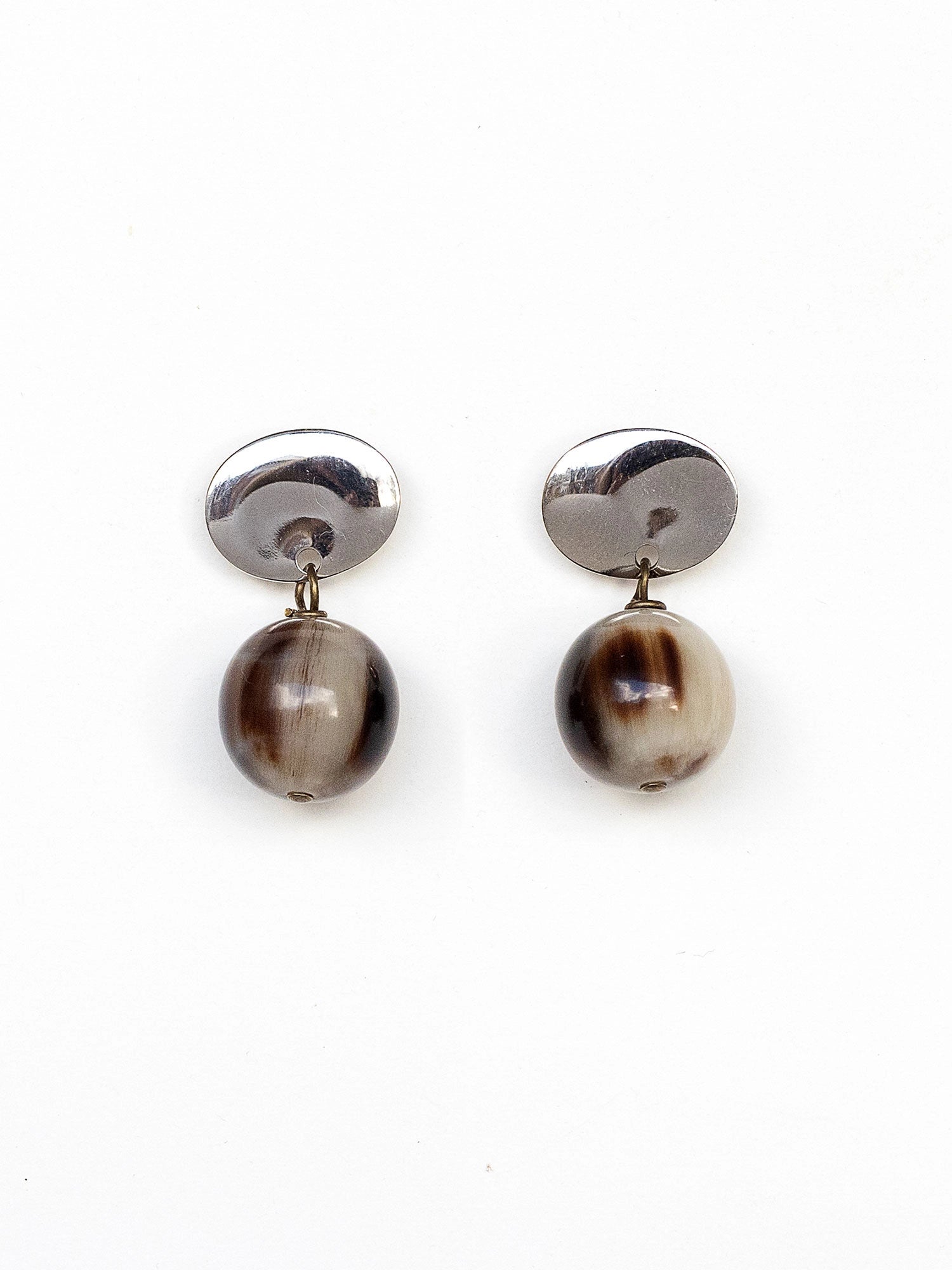 Pair of silver earrings with round brown horn drop beads by Michelle Ross