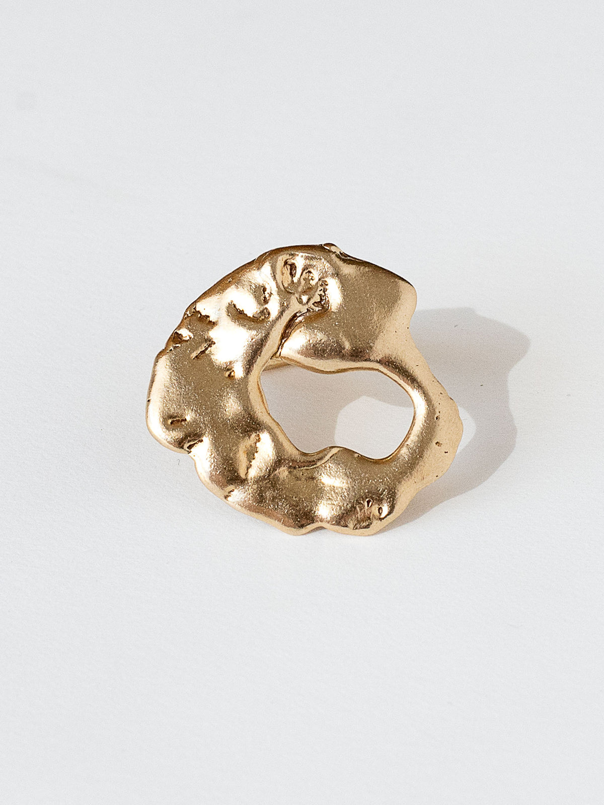 A sculptural statement ring in solid brass handmade by Michelle Ross in Toronto, Canada