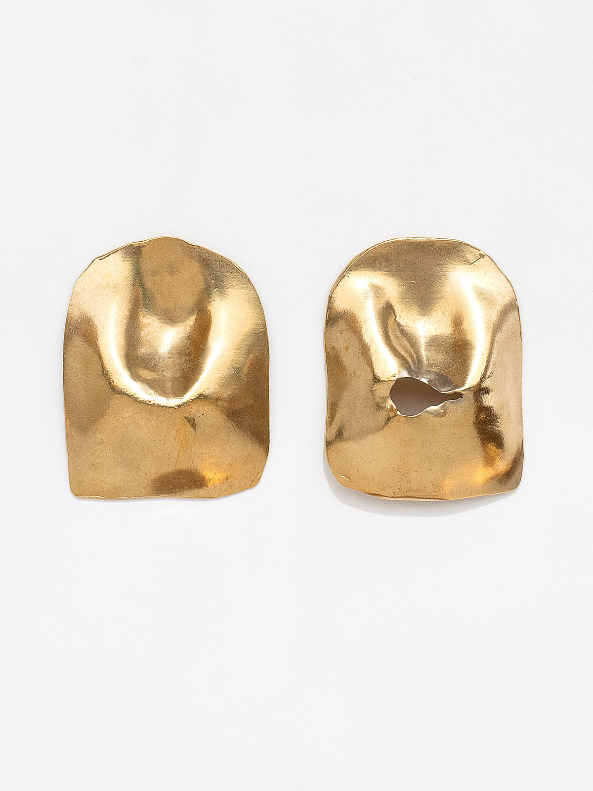 pair of gold brass coloured statement stud earrings by Michelle Ross