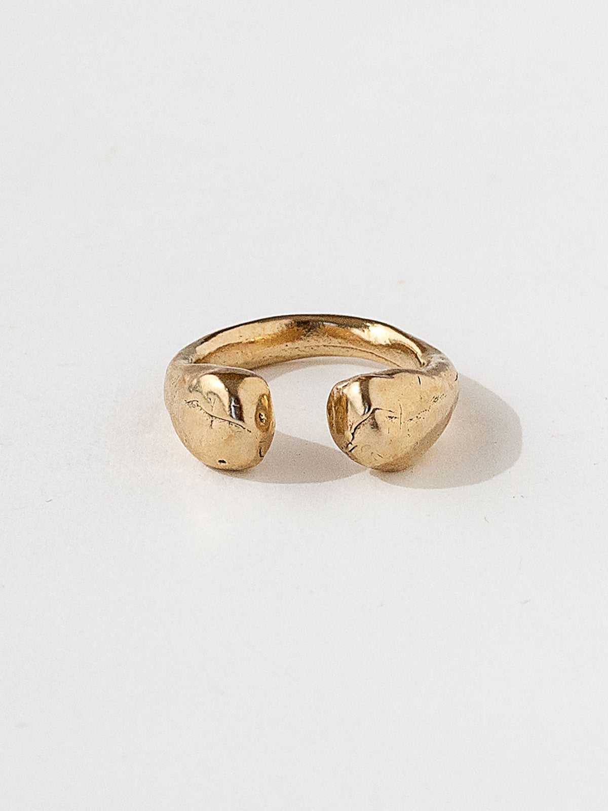 A handmade solid brass ring with an artistic front gap by Michelle Ross in Toronto, Canada