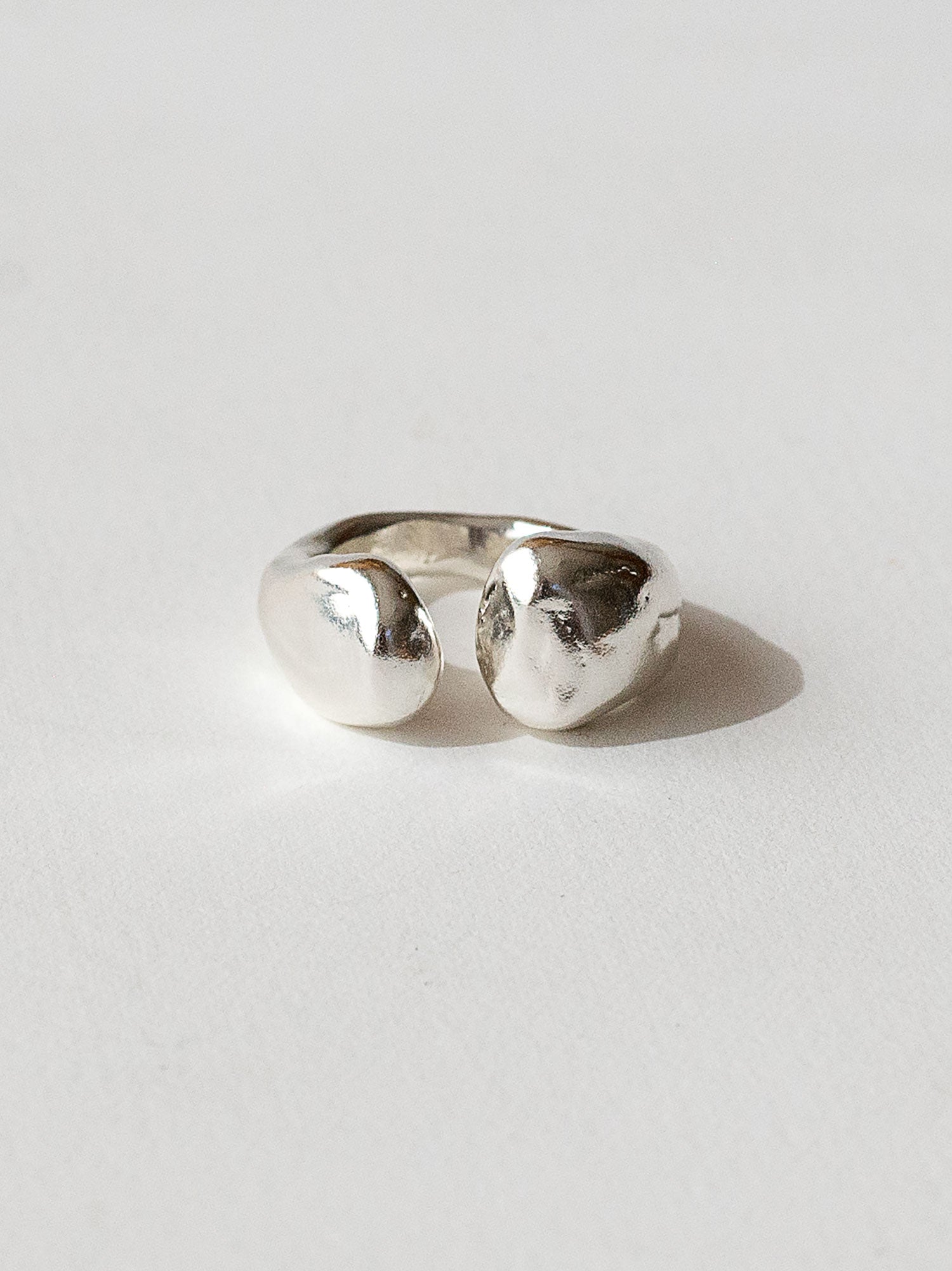 A handmade solid silver ring with an artistic front gap by Michelle Ross in Toronto, Canada