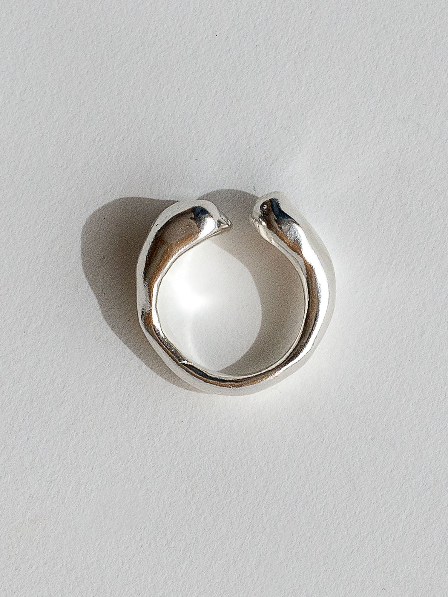 A handmade solid silver ring with an artistic front gap by Michelle Ross in Toronto, Canada