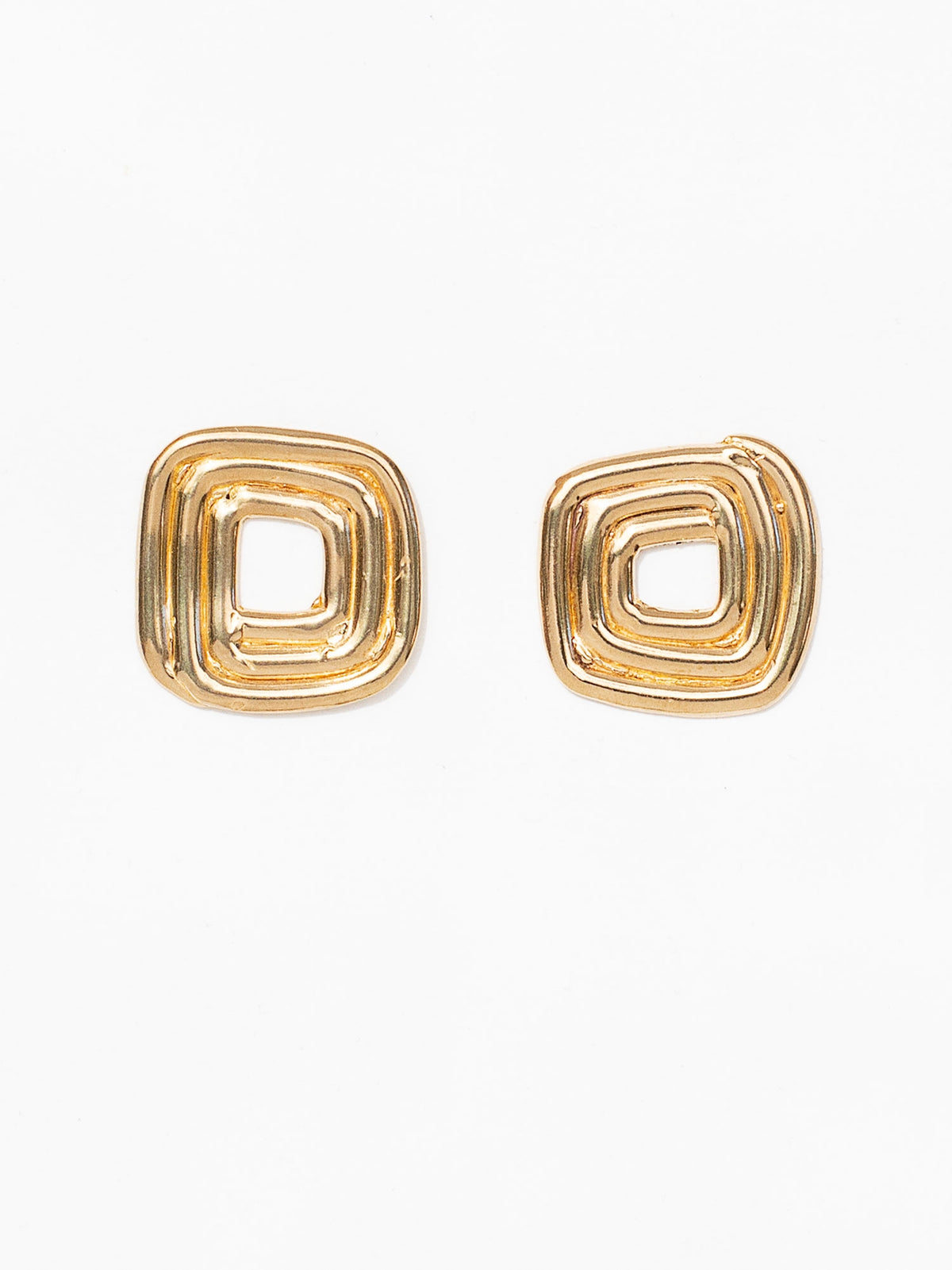 A set brass spiral stud earrings by Canadian jewellery designer Michelle Ross 