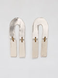 Pair of silver statement earrings by Michelle Ross