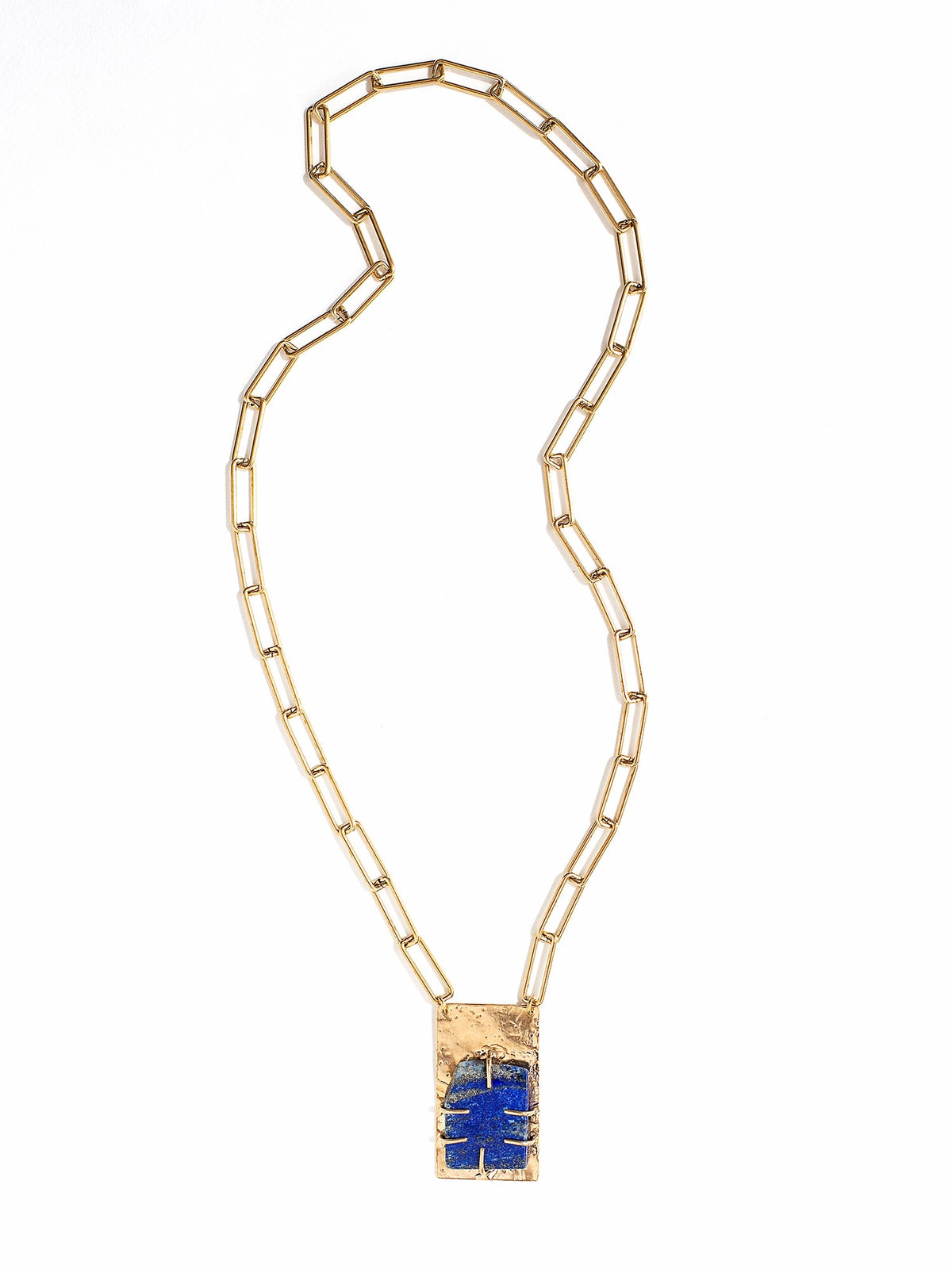 A brass chain link necklace with lapis lazuli and brass pendant handcrafted by Canadian jewelry designer Michelle Ross