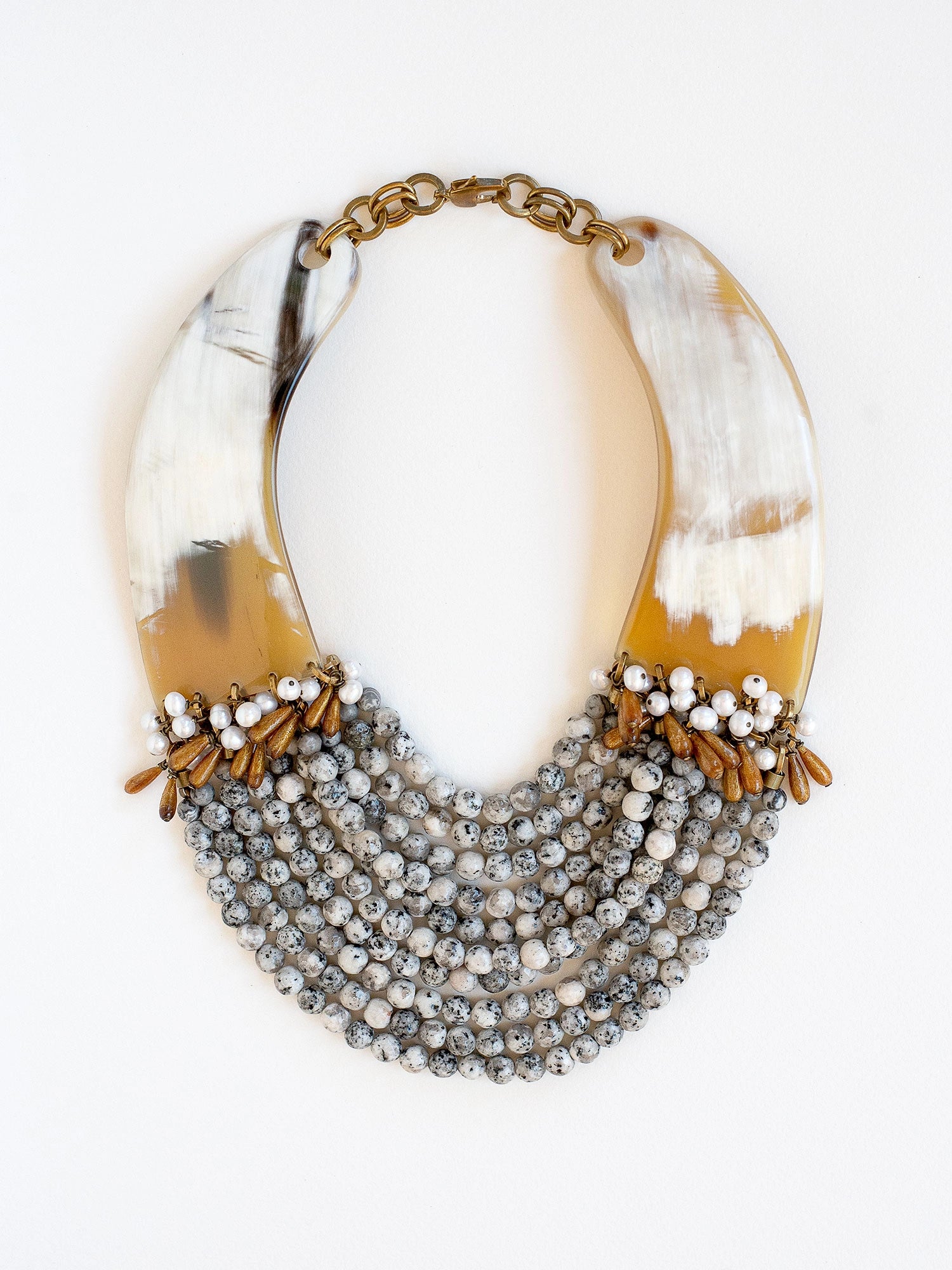 Necklace with layered beads of sesame jasper, sea bamboo & fresh water pearl with and horn collar necklace by Michelle Ross