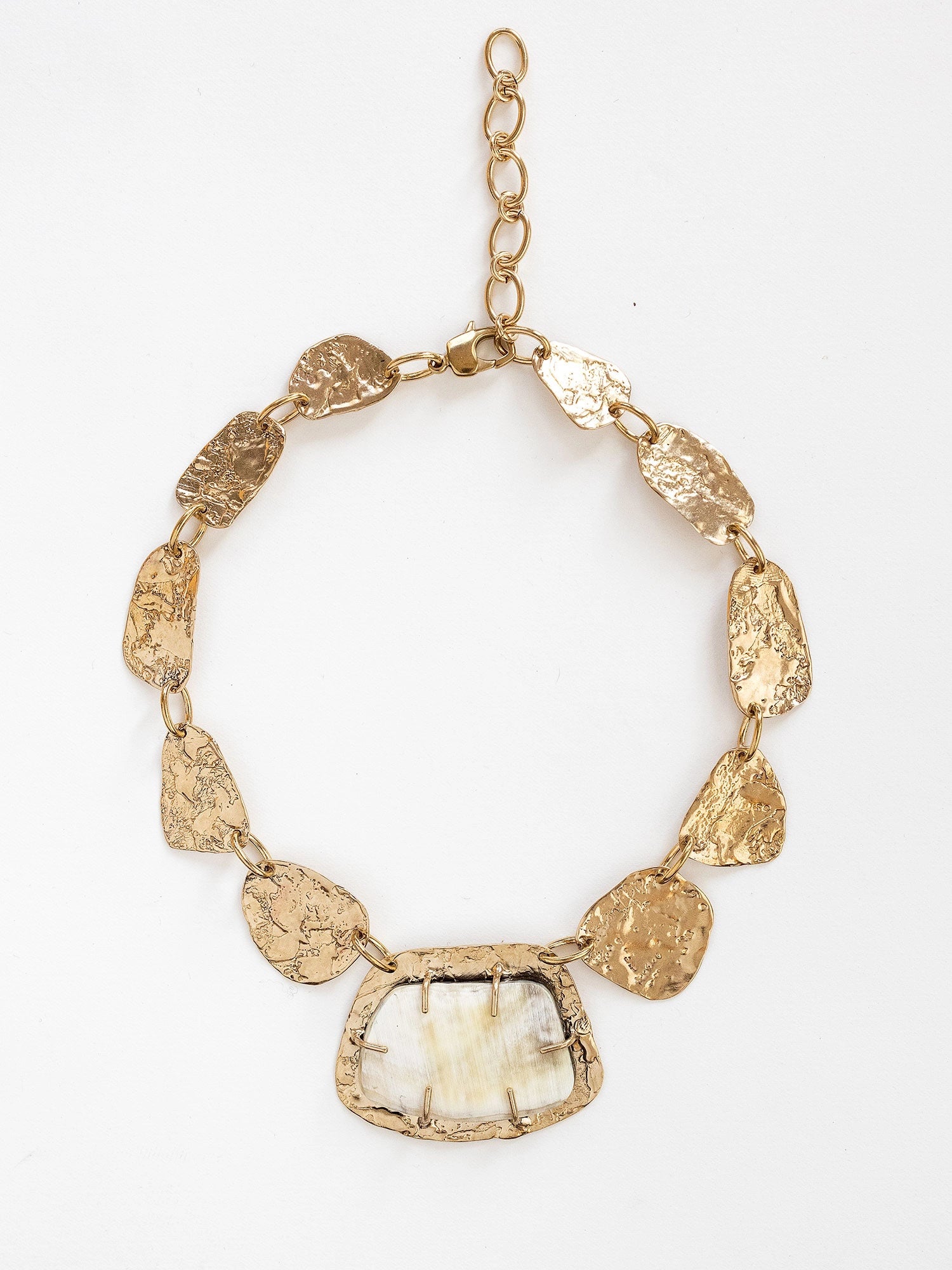 Brass Statement Necklace with large central horn pendant and brass hand formed discs by Michelle Ross