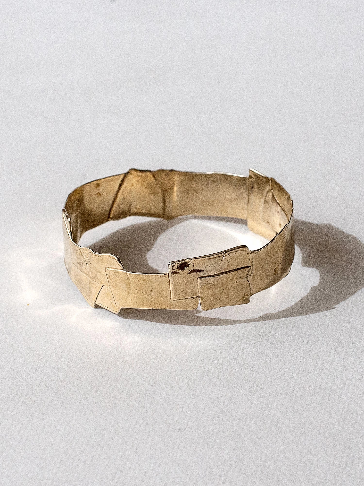 A brass bangle cuff bracelet by Canadian jewellery designer Michelle Ross