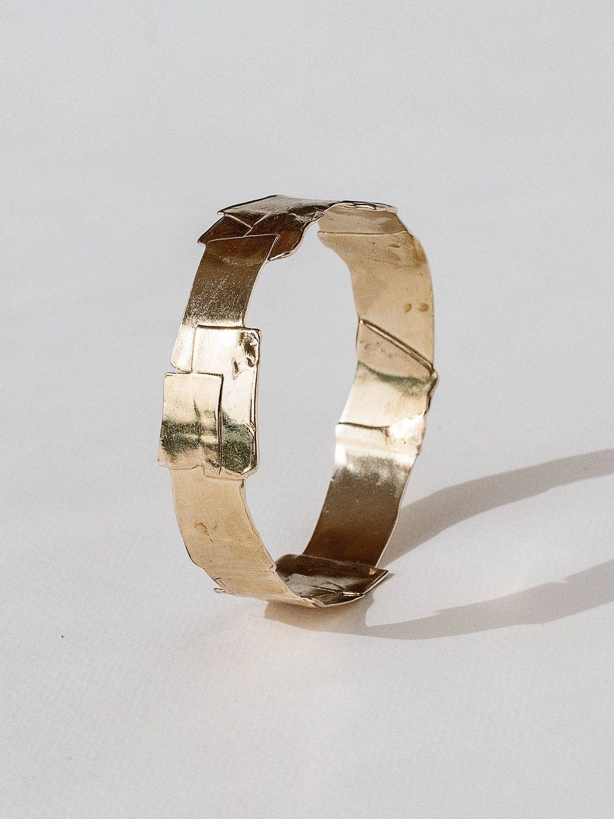 A brass bangle cuff bracelet by Canadian jewellery designer Michelle Ross