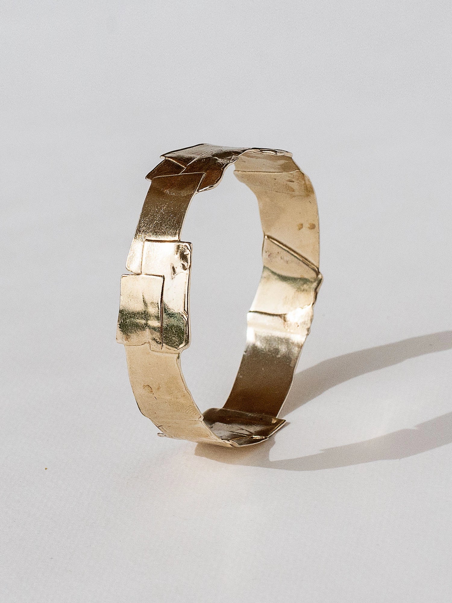 A brass bangle cuff bracelet by Canadian jewellery designer Michelle Ross