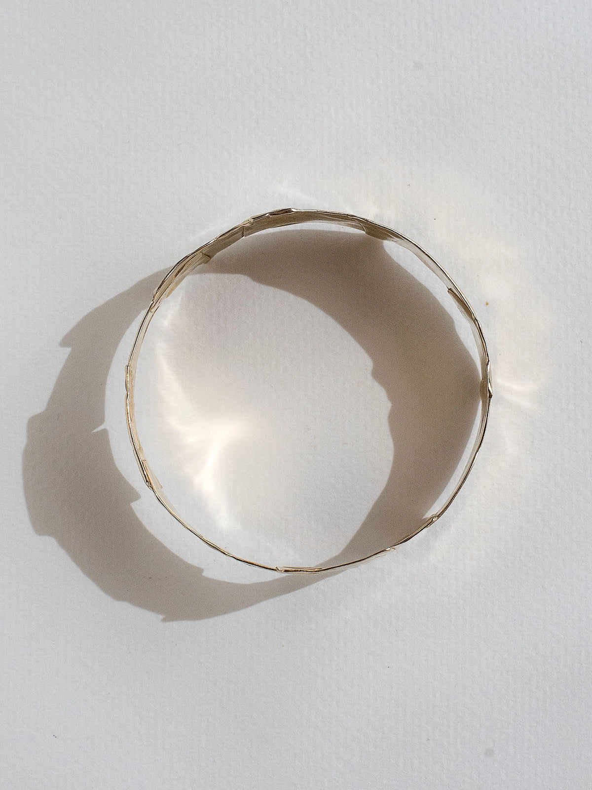 A brass bangle cuff bracelet by Canadian jewellery designer Michelle Ross