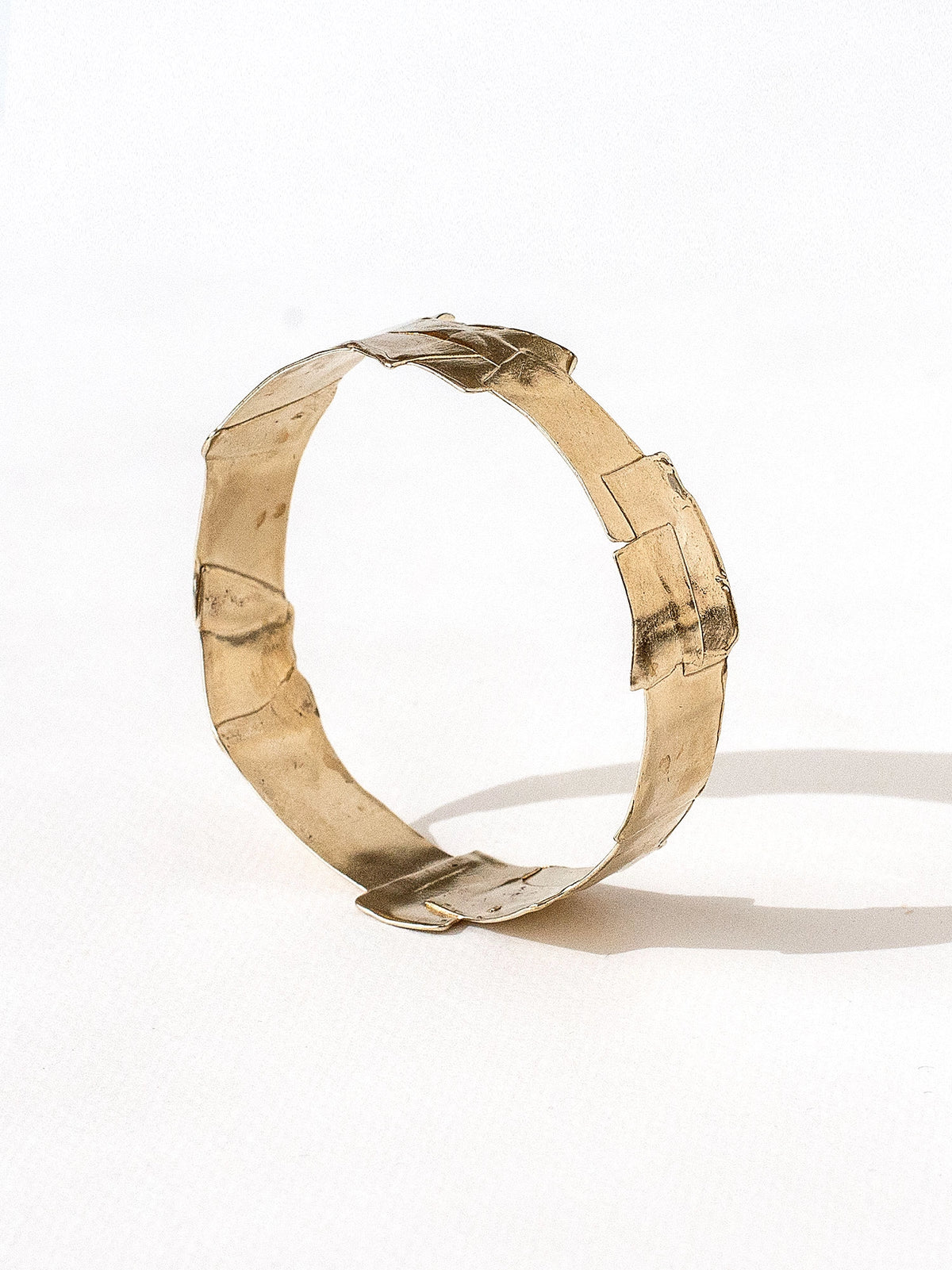 A solid brass bangle cuff bracelet by Canadian jewellery designer Michelle Ross