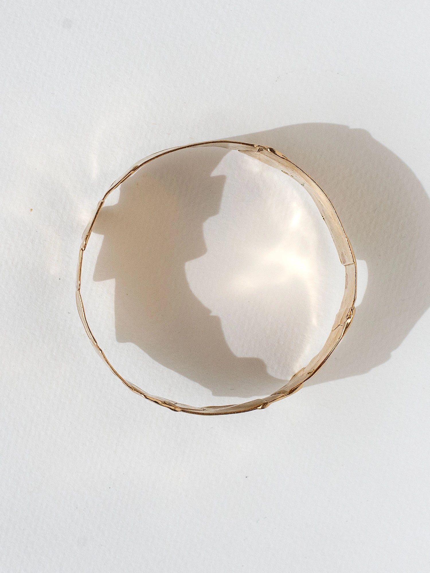 wide brass statement bangle by Toronto designer Michelle Ross