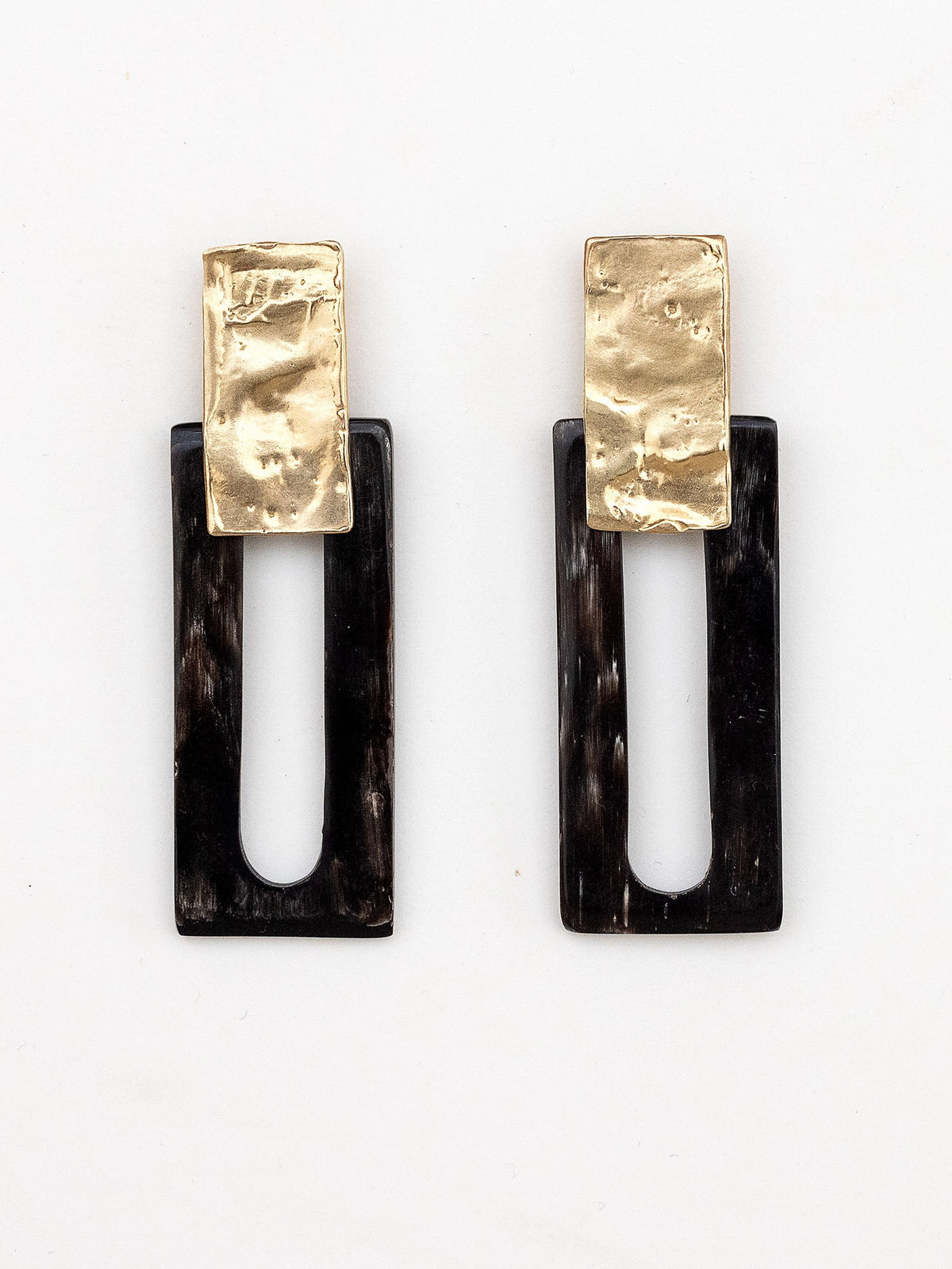 Pair of earrings with black horn rectangular design and brass details by Michelle Ross