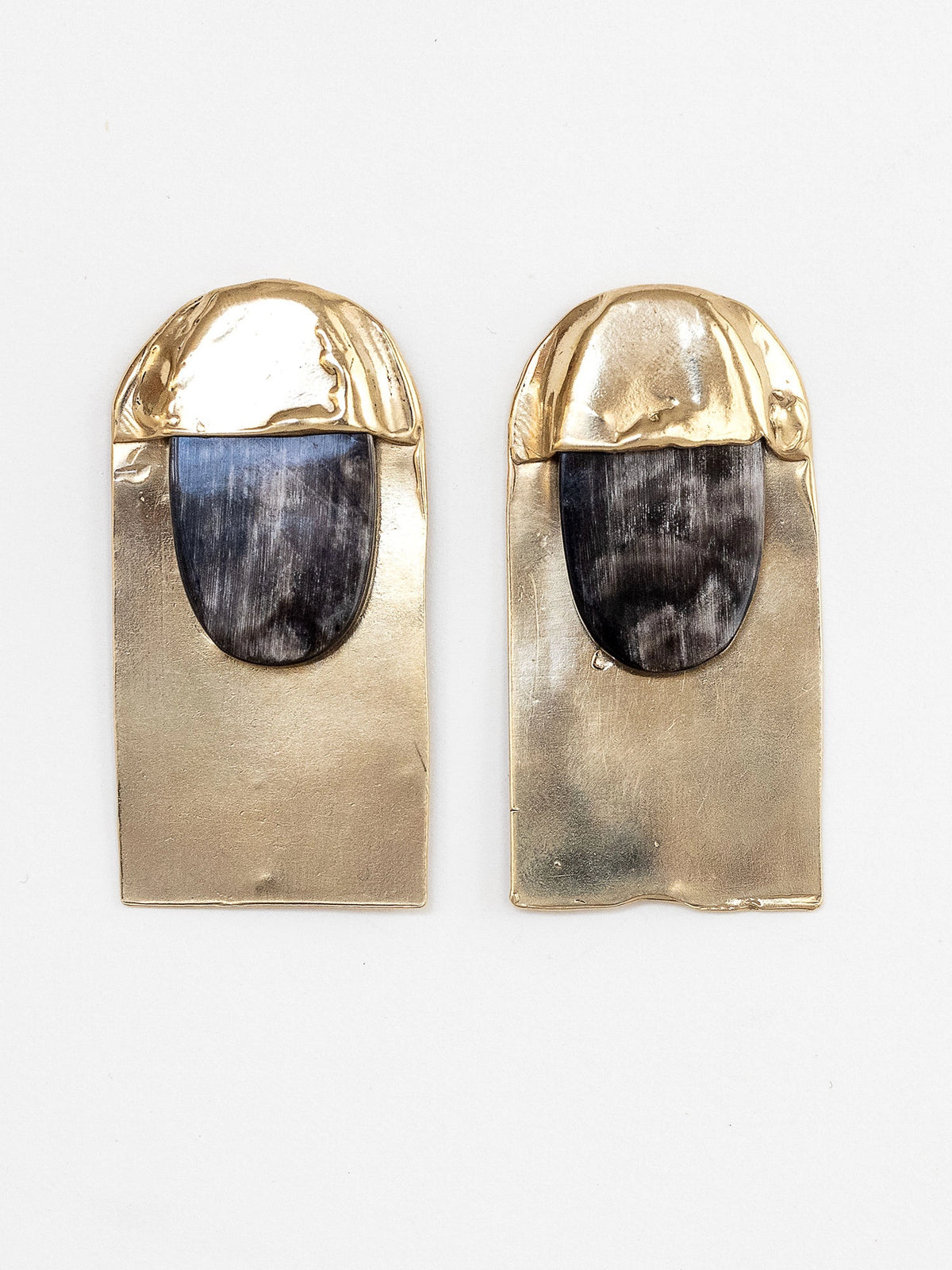 Pair of black horn and brass large statement stud earrings by Michelle Ross