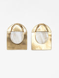 Pair of blonde horn and brass large statement stud earrings by Michelle Ross