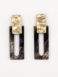 Pair of earrings with marbled black horn rectangular design and brass details by Michelle Ross