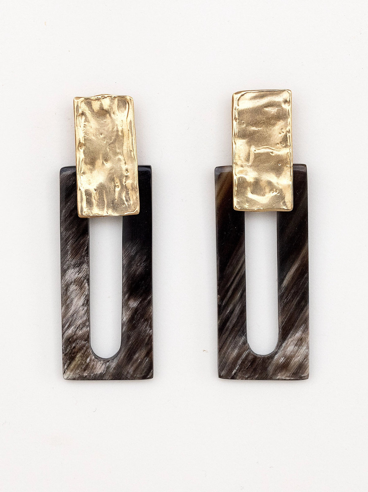 Pair of earrings with marbled black horn rectangular design and brass details by Michelle Ross