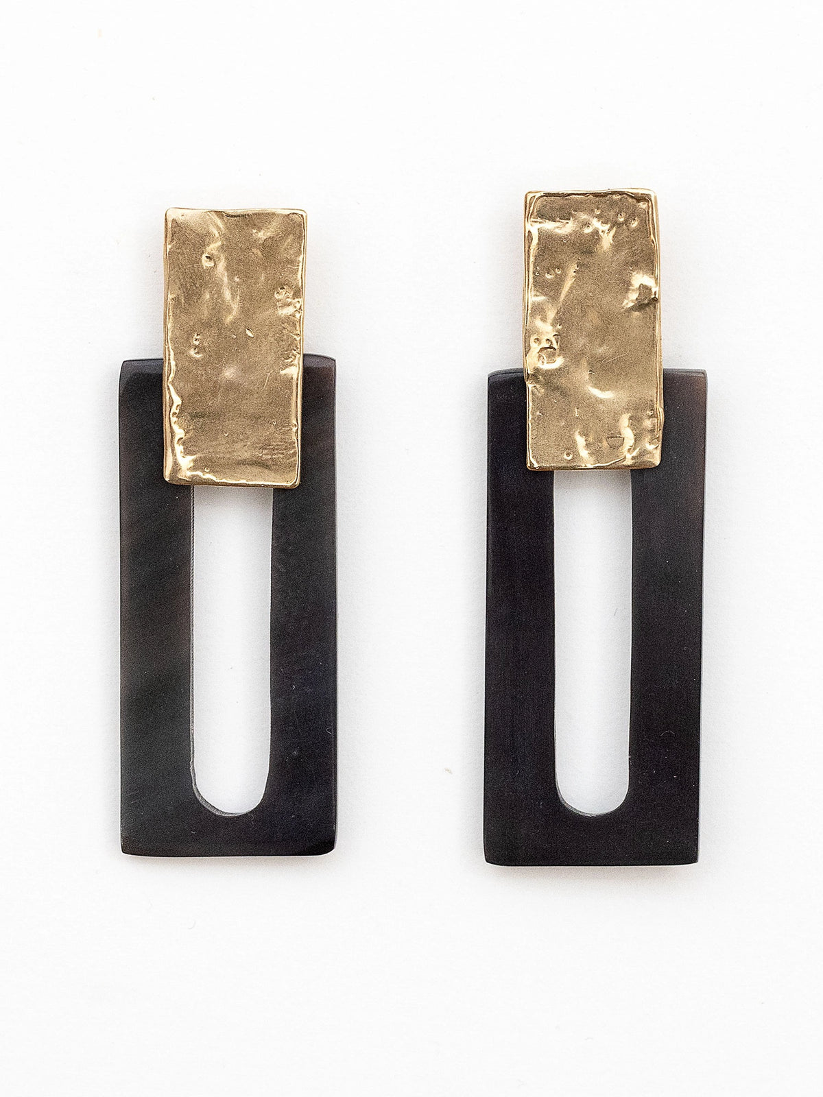 Pair of earrings with black horn rectangular design and brass details by Michelle Ross