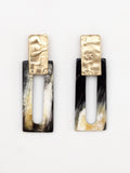 Pair of earrings with marbled black horn rectangular design and brass details by Michelle Ross