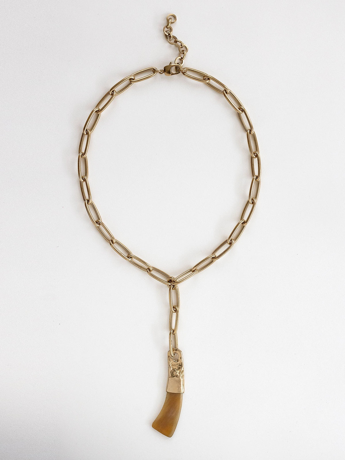 Brass chain link lariat necklace with a large camel horn pendant by Michelle Ross