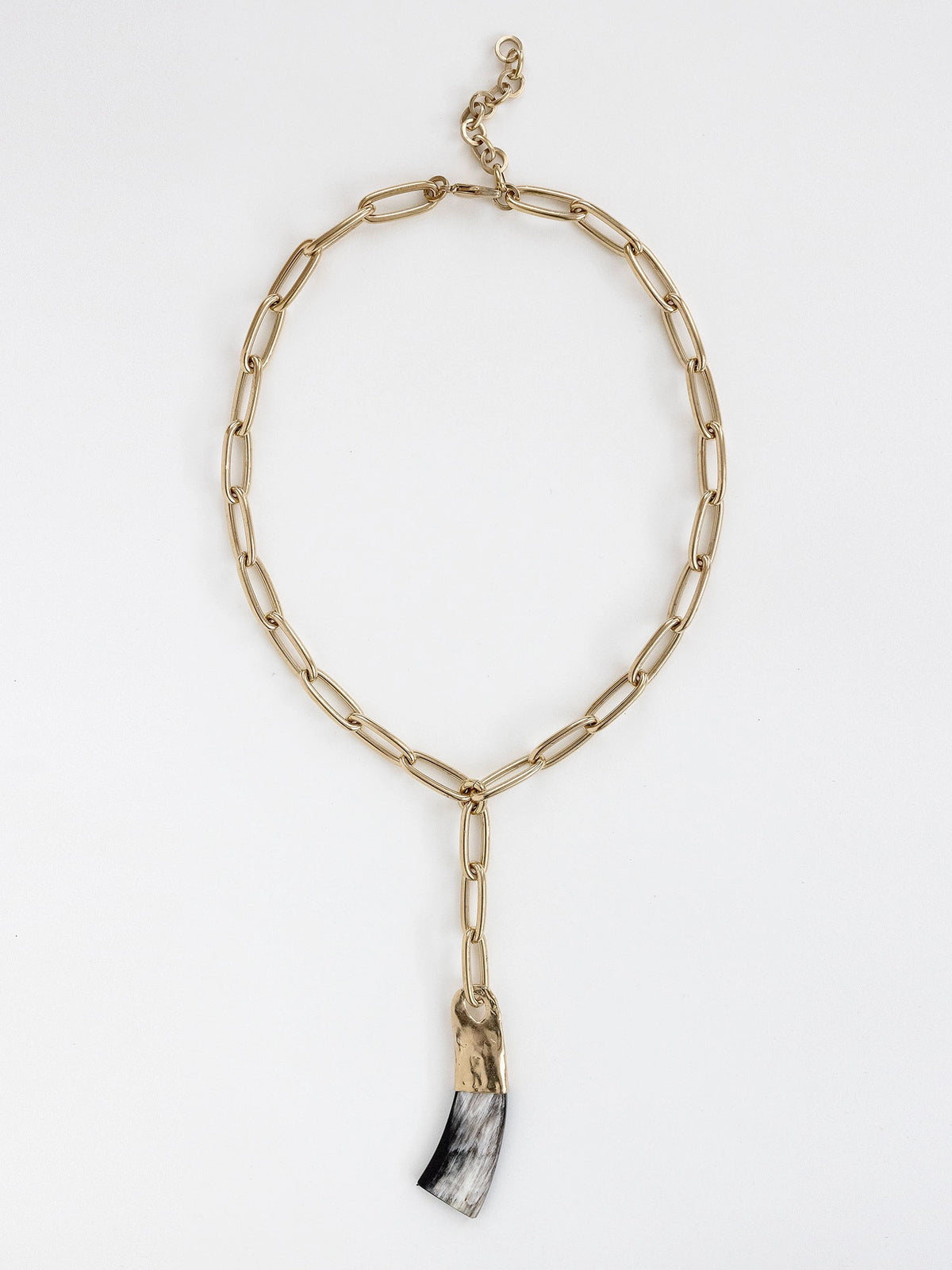 Brass chain link lariat necklace with a large horn pendant by Michelle Ross
