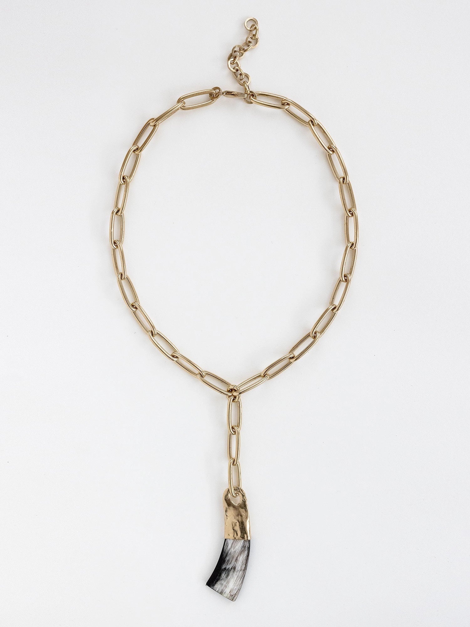 Brass chain link lariat necklace with a large horn pendant by Michelle Ross