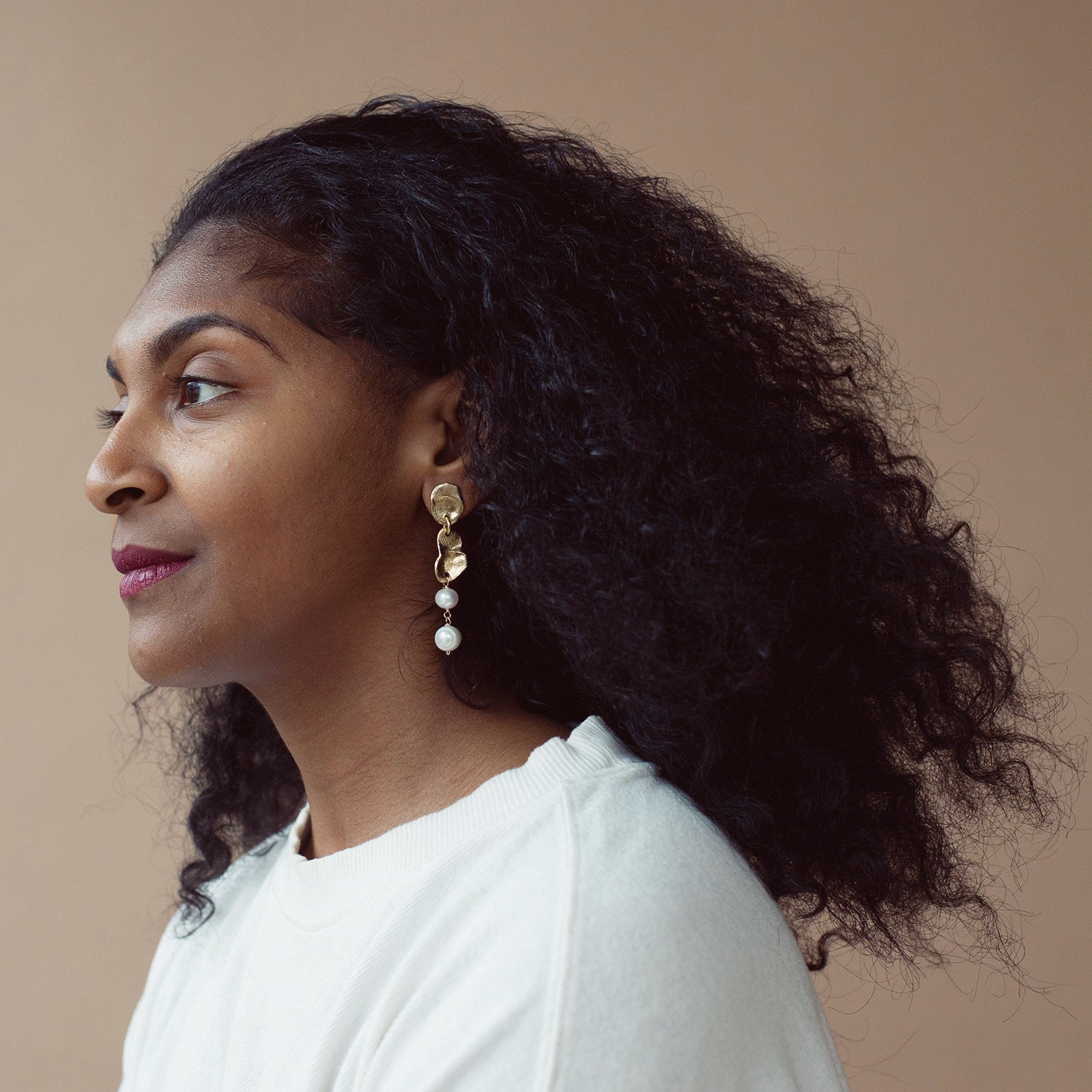 Gold earrings with freshwater pearl drops by Michelle Ross