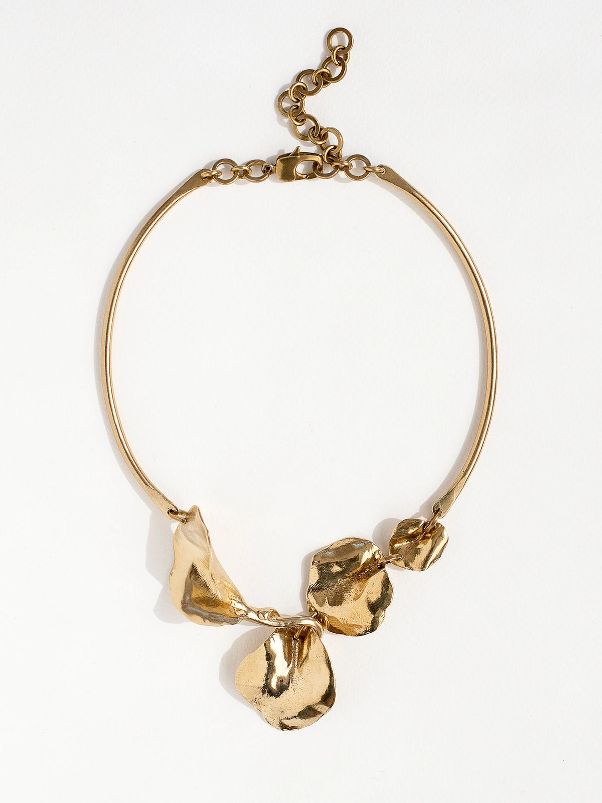 A solid brass collar statement necklace with abstract floral details by Canadian jewelry designer Michelle Ross