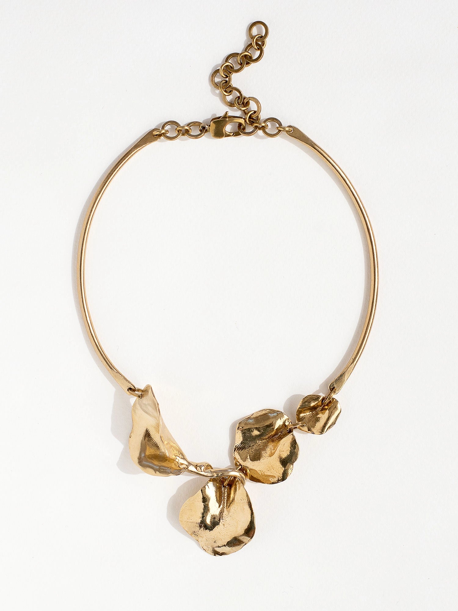 A solid brass collar statement necklace with abstract floral details by Canadian jewelry designer Michelle Ross
