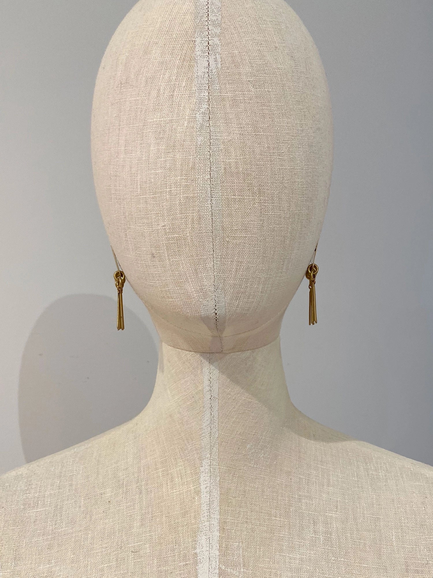 gold brass fringe dangle statement earrings by Michelle Ross