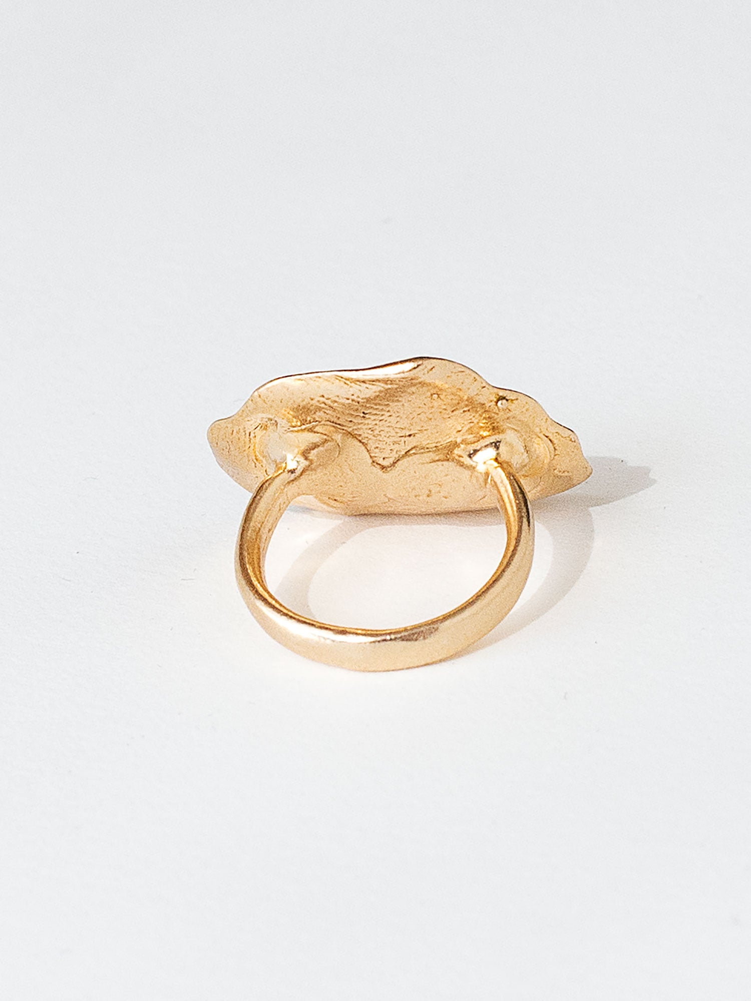 A sculptural statement ring in solid brass handmade by Michelle Ross in Toronto, Canada