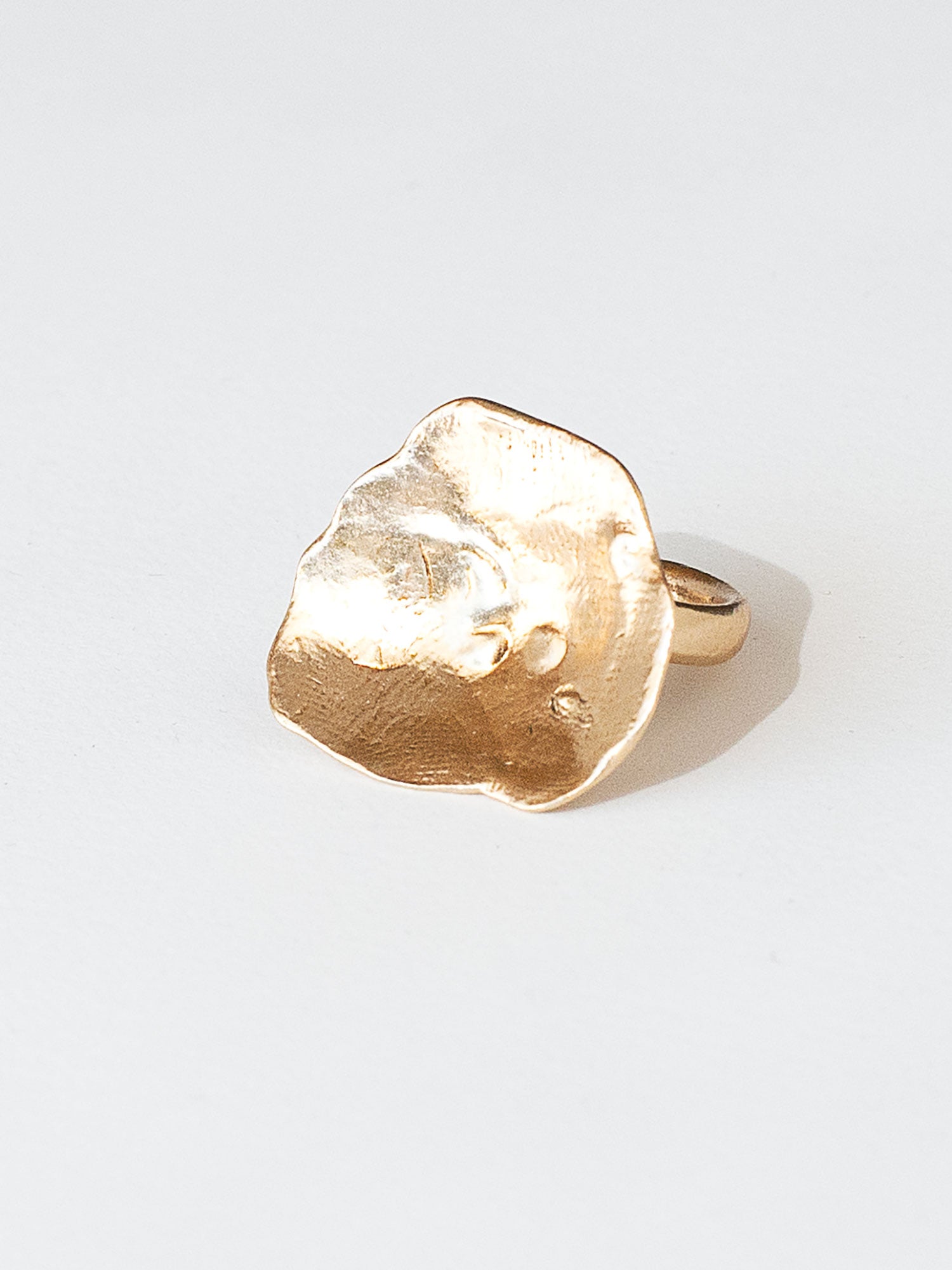A sculptural statement ring in solid brass handmade by Michelle Ross in Toronto, Canada