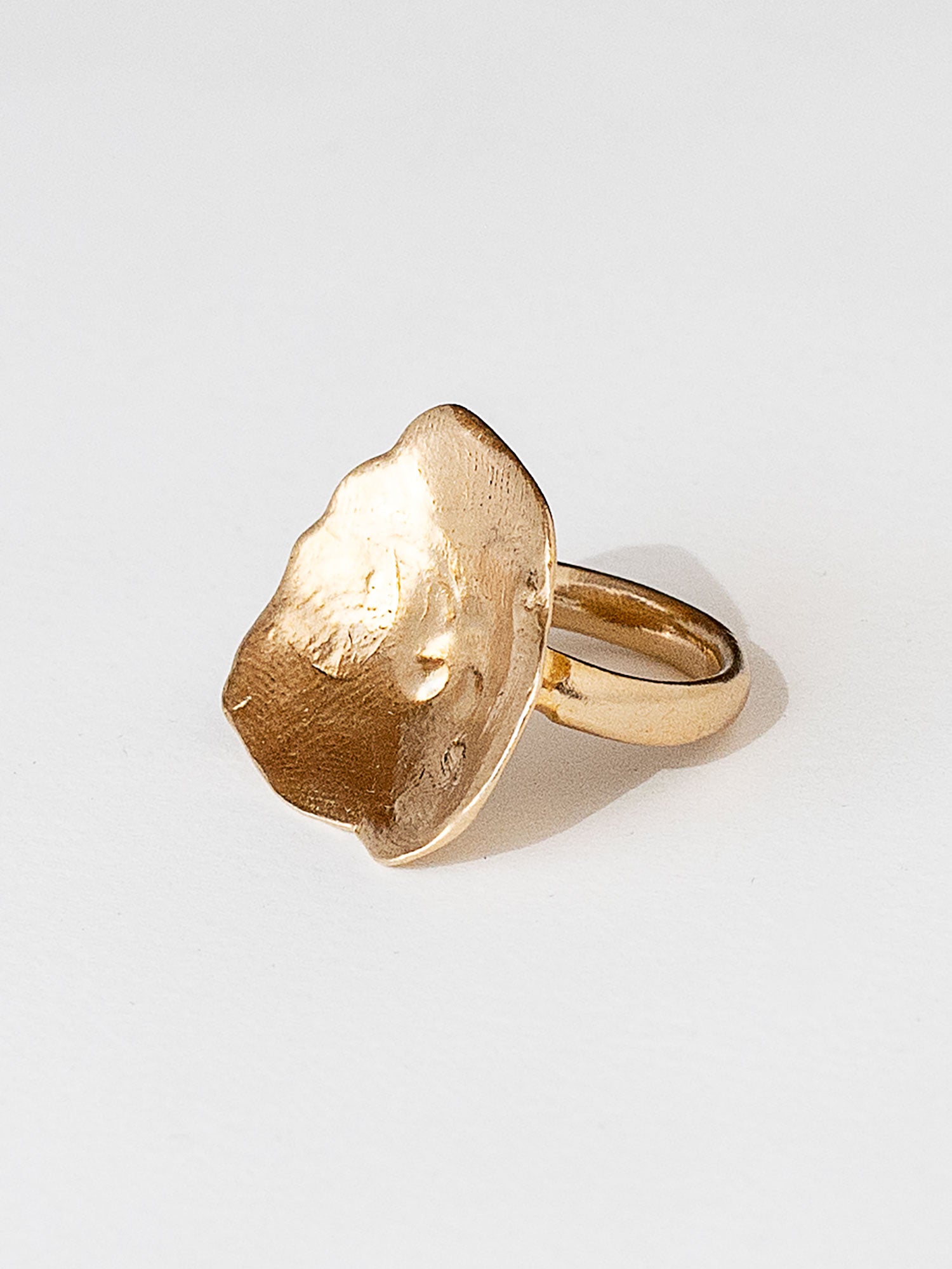 A sculptural statement ring in solid brass handmade by Michelle Ross in Toronto, Canada