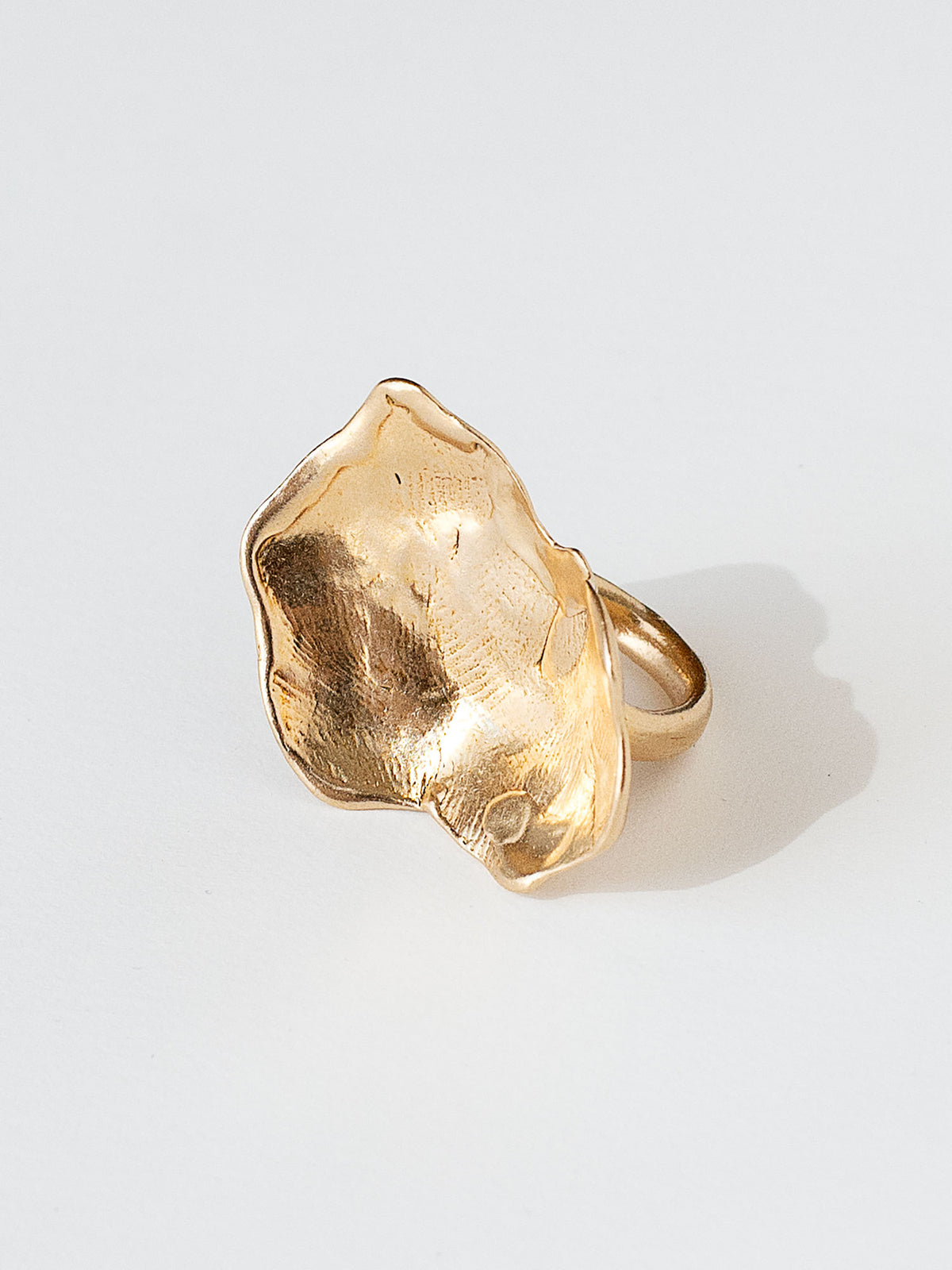 A sculptural statement ring in solid brass handmade by Michelle Ross in Toronto, Canada