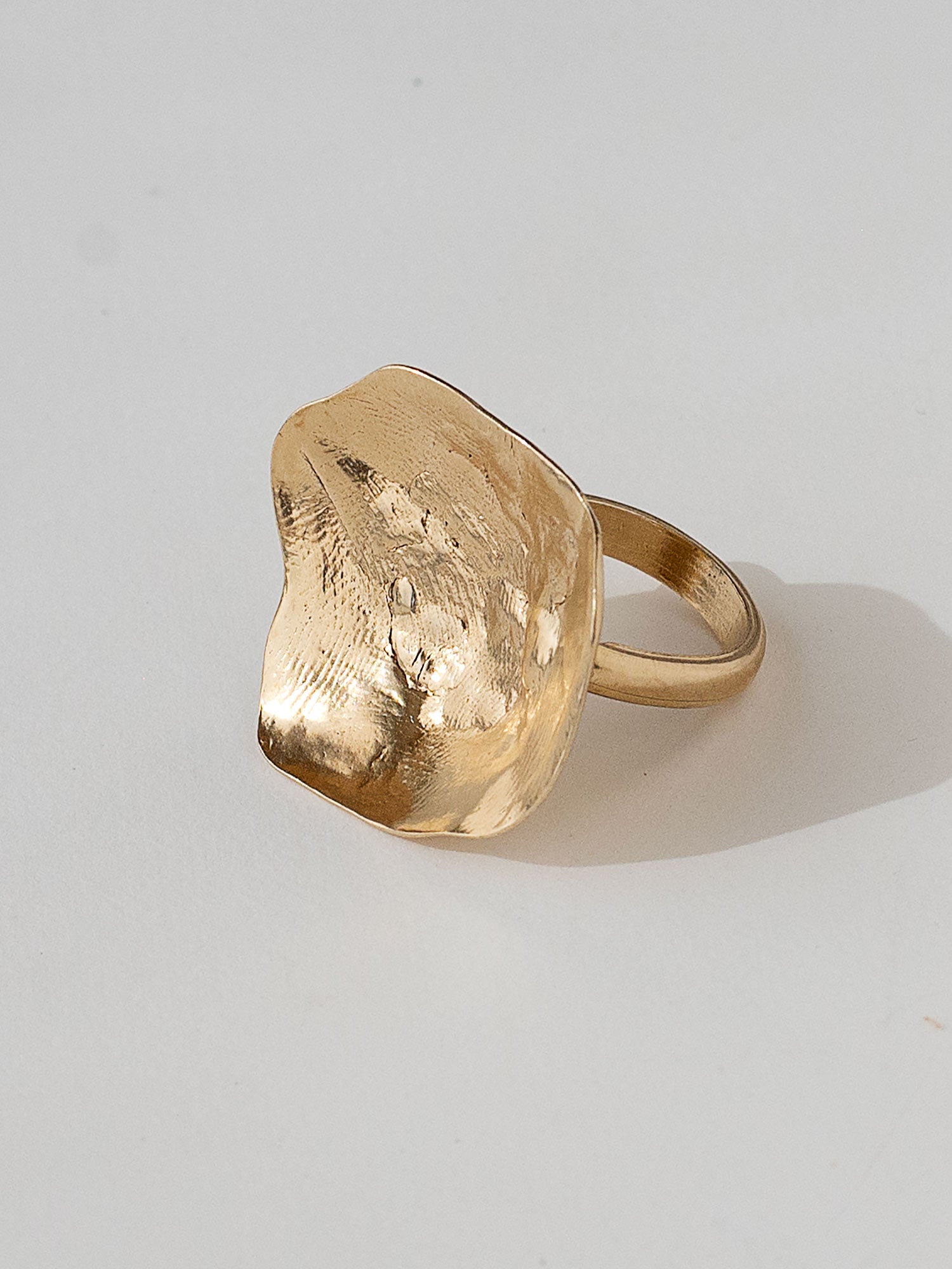 A sculptural statement ring in solid brass handmade by Michelle Ross in Toronto, Canada