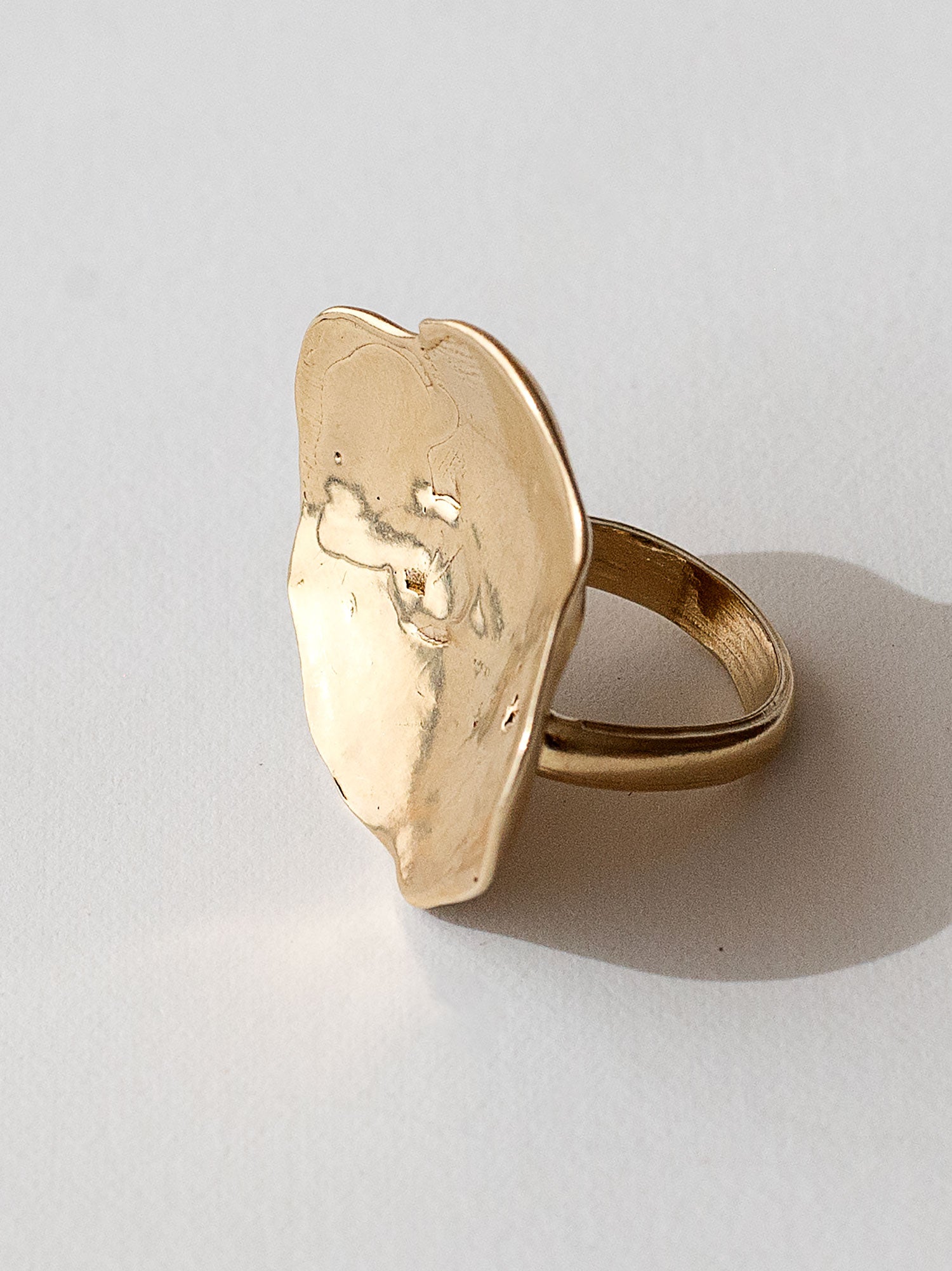 A sculptural statement ring in solid brass handmade by Michelle Ross in Toronto, Canada
