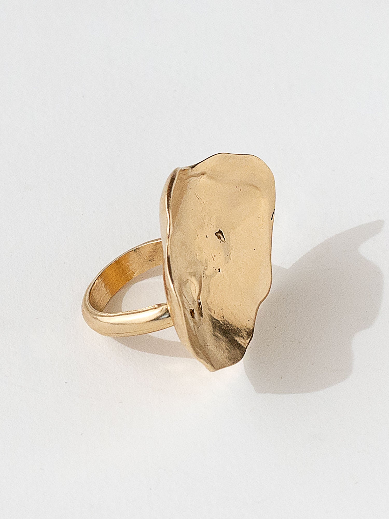 A sculptural statement ring in solid brass handmade by Michelle Ross in Toronto, Canada