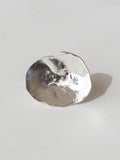 A sculptural statement ring in solid silver handmade by Michelle Ross in Toronto, Canada