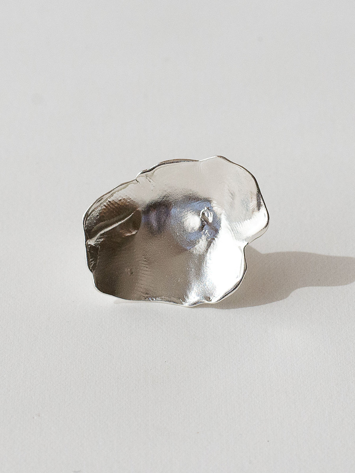 A sculptural statement ring in solid silver handmade by Michelle Ross in Toronto, Canada