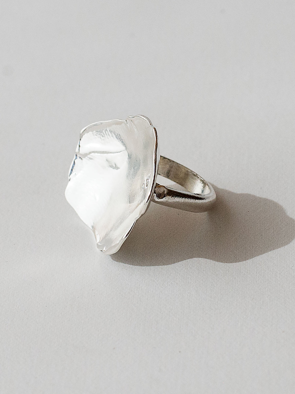 A sculptural statement ring in solid silver handmade by Michelle Ross in Toronto, Canada
