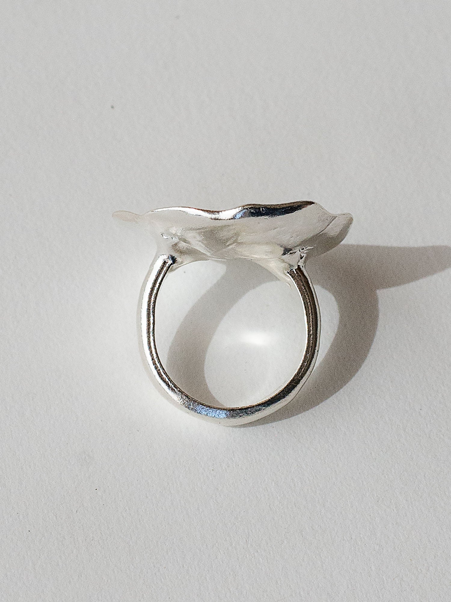 A sculptural statement ring in solid silver handmade by Michelle Ross in Toronto, Canada