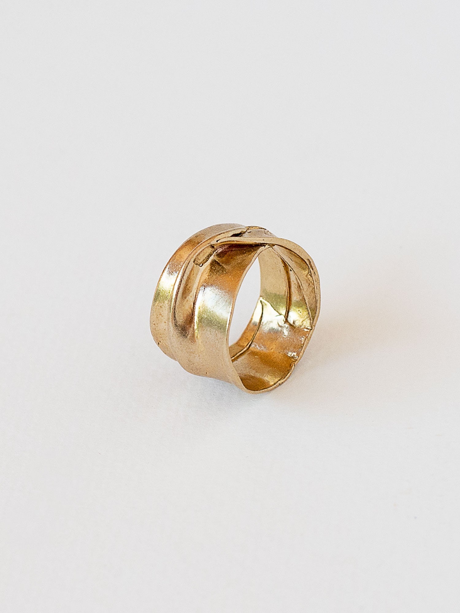 Wide gold coloured brass ring by canadian jewelry designer Michelle Ross
