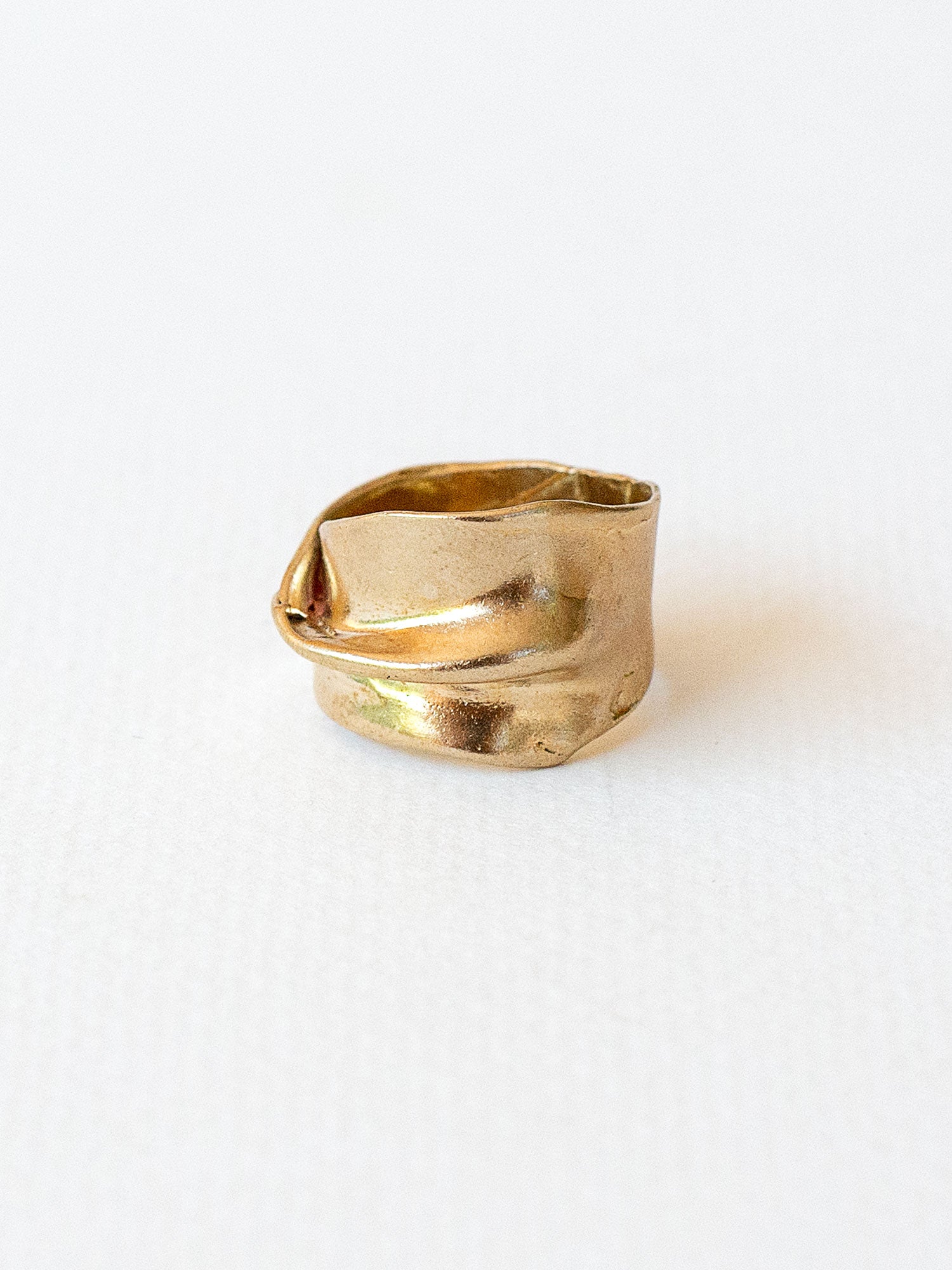 Wide gold coloured brass ring by canadian jewelry designer Michelle Ross