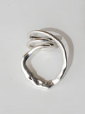 A handmade solid sterling silver ring in an artistic twisting shape by Michele Ross in Toronto, Canada